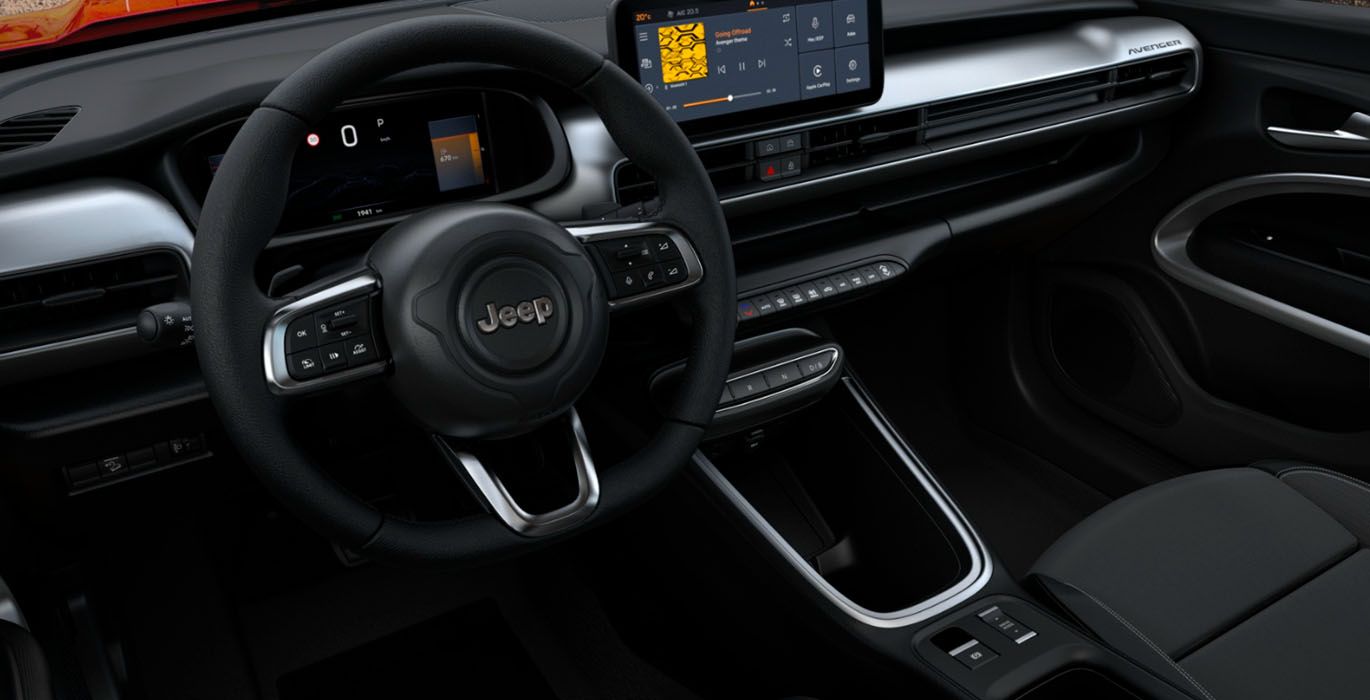 JEEP AVENGER E-HYBRID ALTITUDE 4 JEEP AVENGER MHEV 1.2 ALTITUDE 100CV interior delantera | Crazy Renting