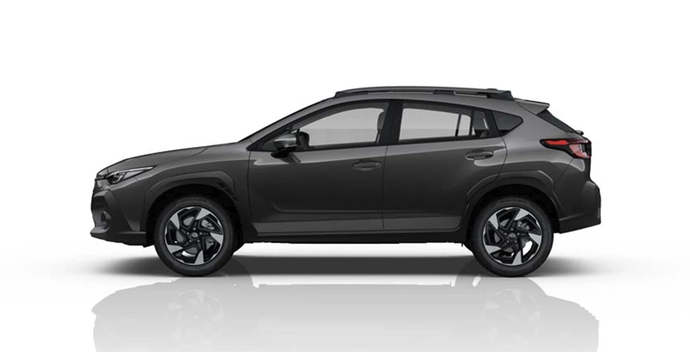 Subaru Crosstrek 2.0i Hybrid Field CVT 2 Subaru Crosstrek 2.0i Hybrid Field CVT lateral gris oscuro | Crazy Renting
