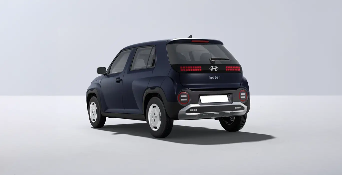 Hyundai Inster 97cv 42kWh Klass azul trasera | Crazy Renting
